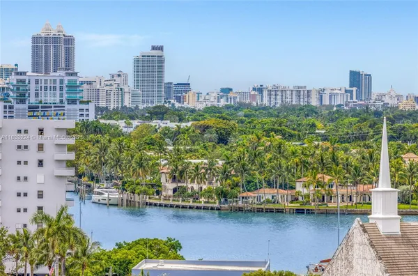 a view of a city with tall buildings