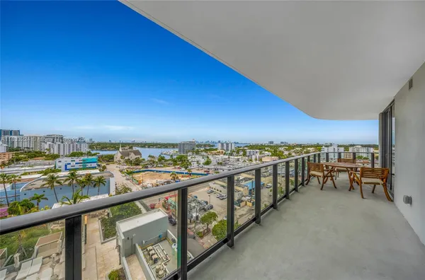 a view of a balcony with city view