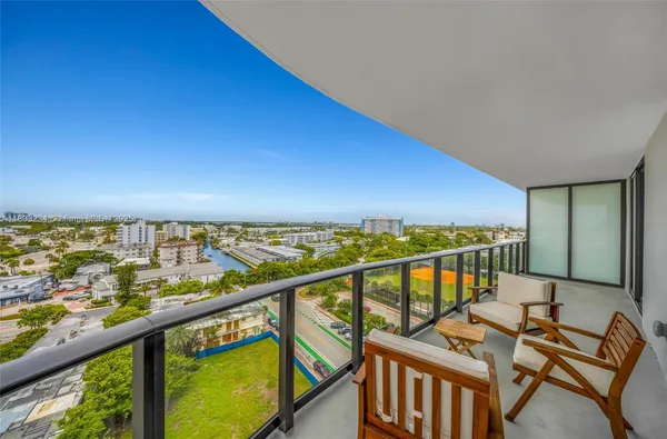 a balcony with a city view