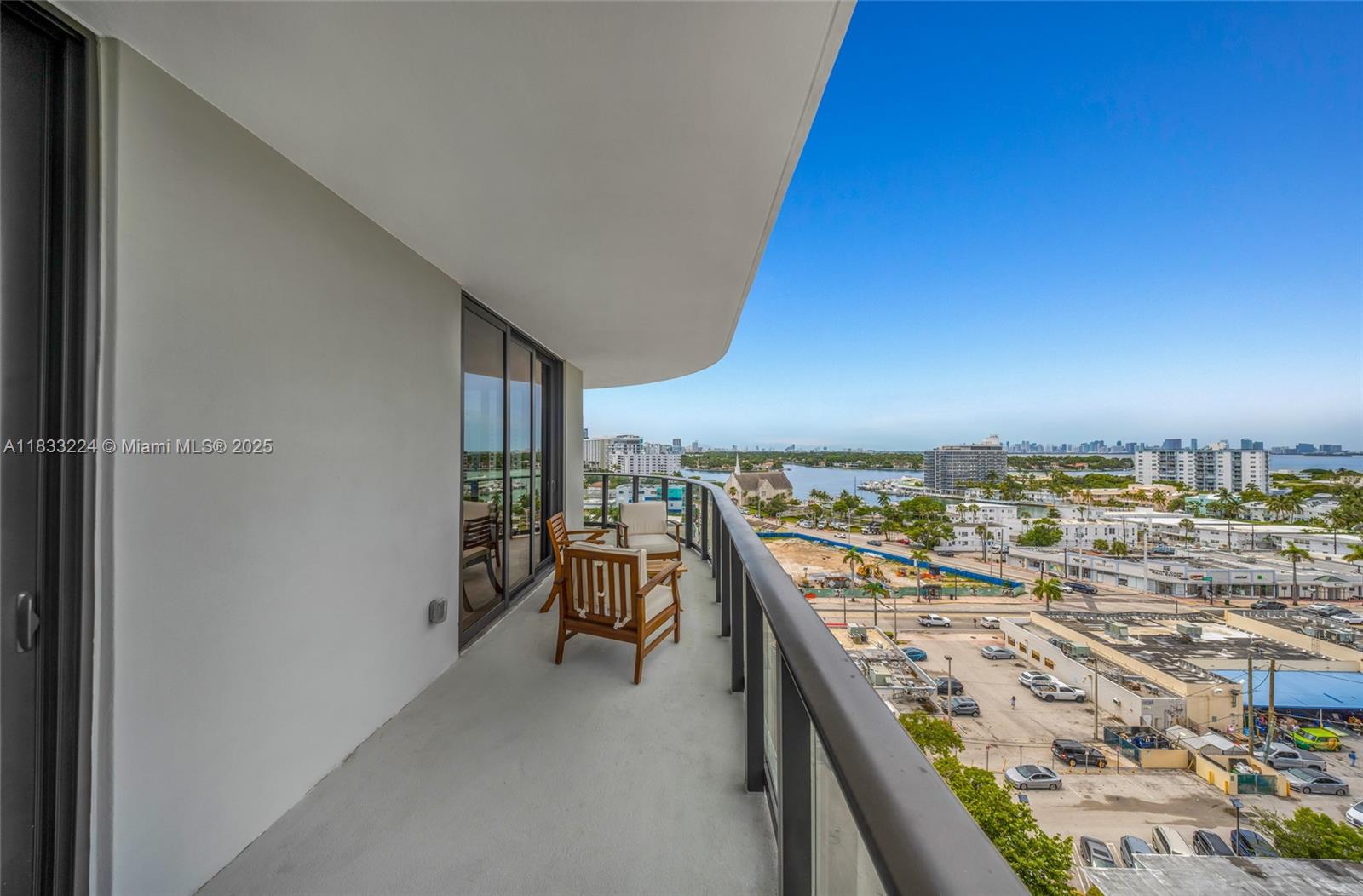 580 72nd Street, Unit 910 Miami Beach, FL 33141 - Photo 34 of 46 a balcony with a city view