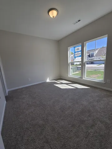 an empty room with window