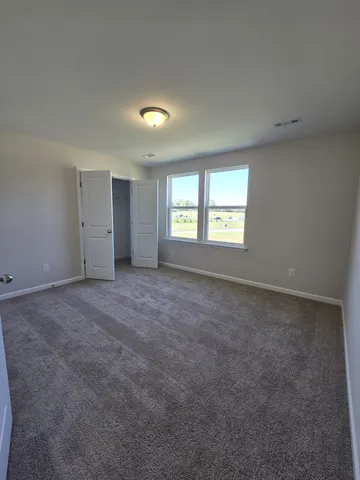 an empty room with windows