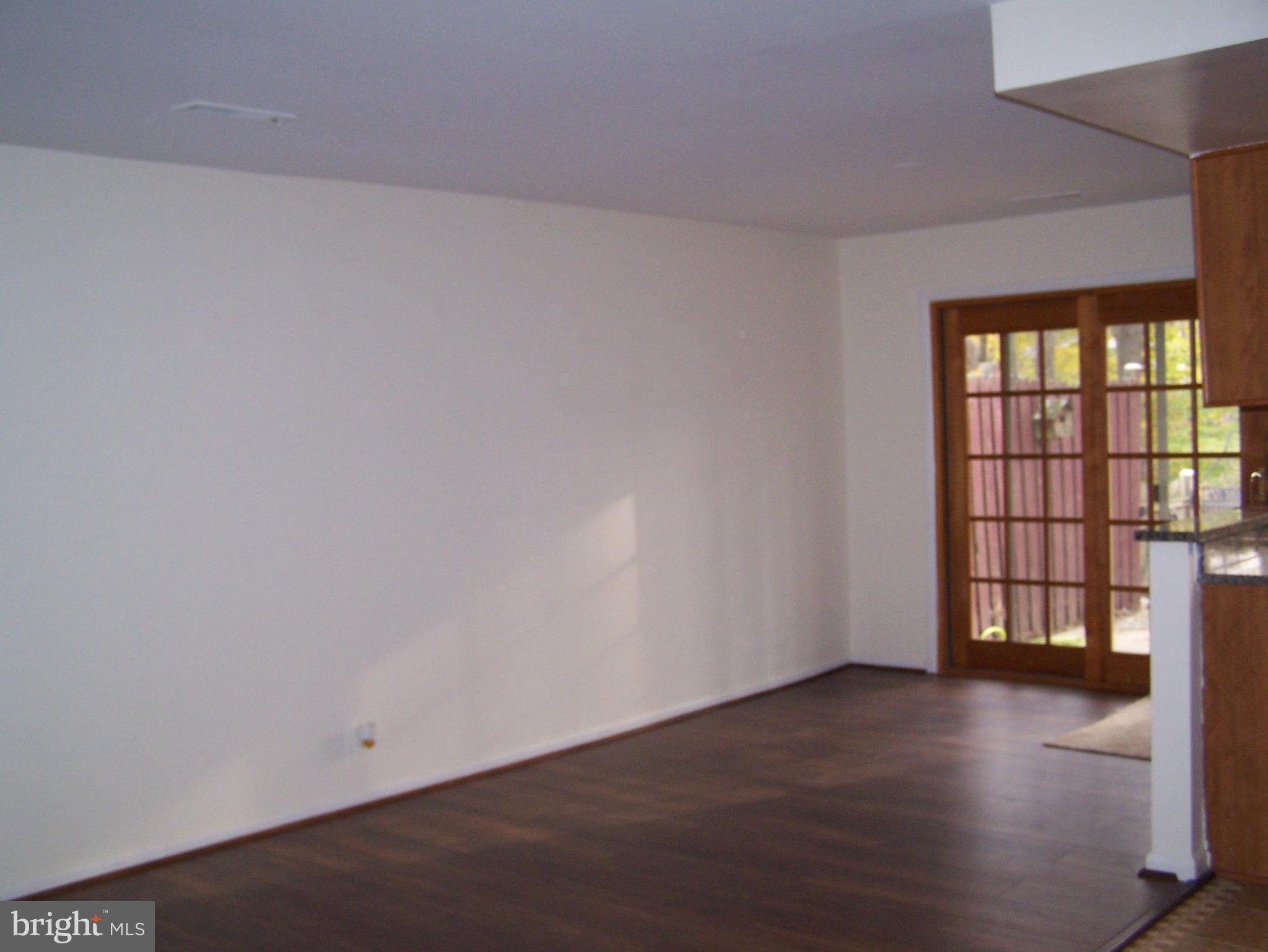 2850 Aquarius Avenue Silver Spring, MD 20906 - Photo 9 of 26 New laminated floors