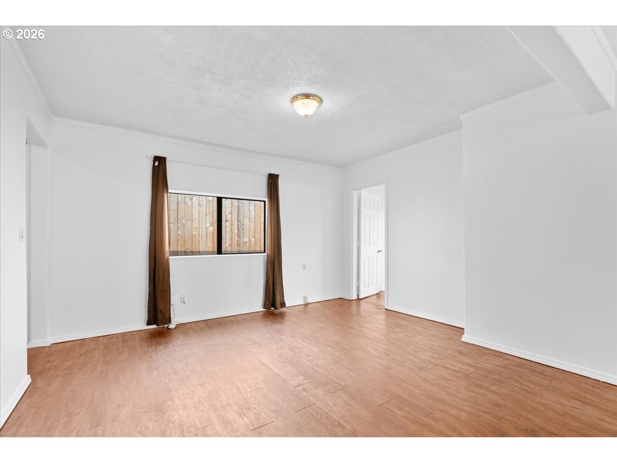 1070 Deer Island Road St. Helens, OR 97051 - Photo 15 of 34 a view of an empty room with wooden floor