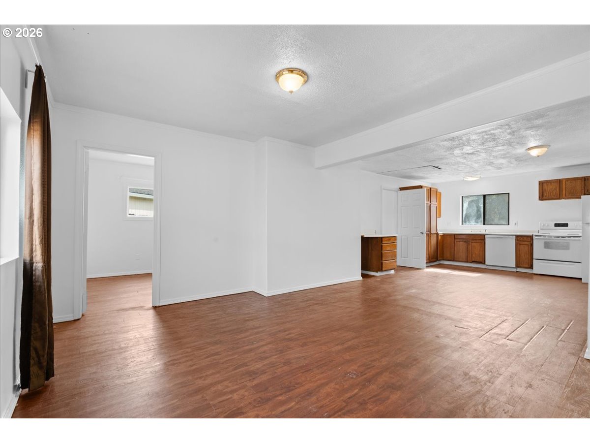 1070 Deer Island Road St. Helens, OR 97051 - Photo 16 of 34 a view of empty room with wooden floor