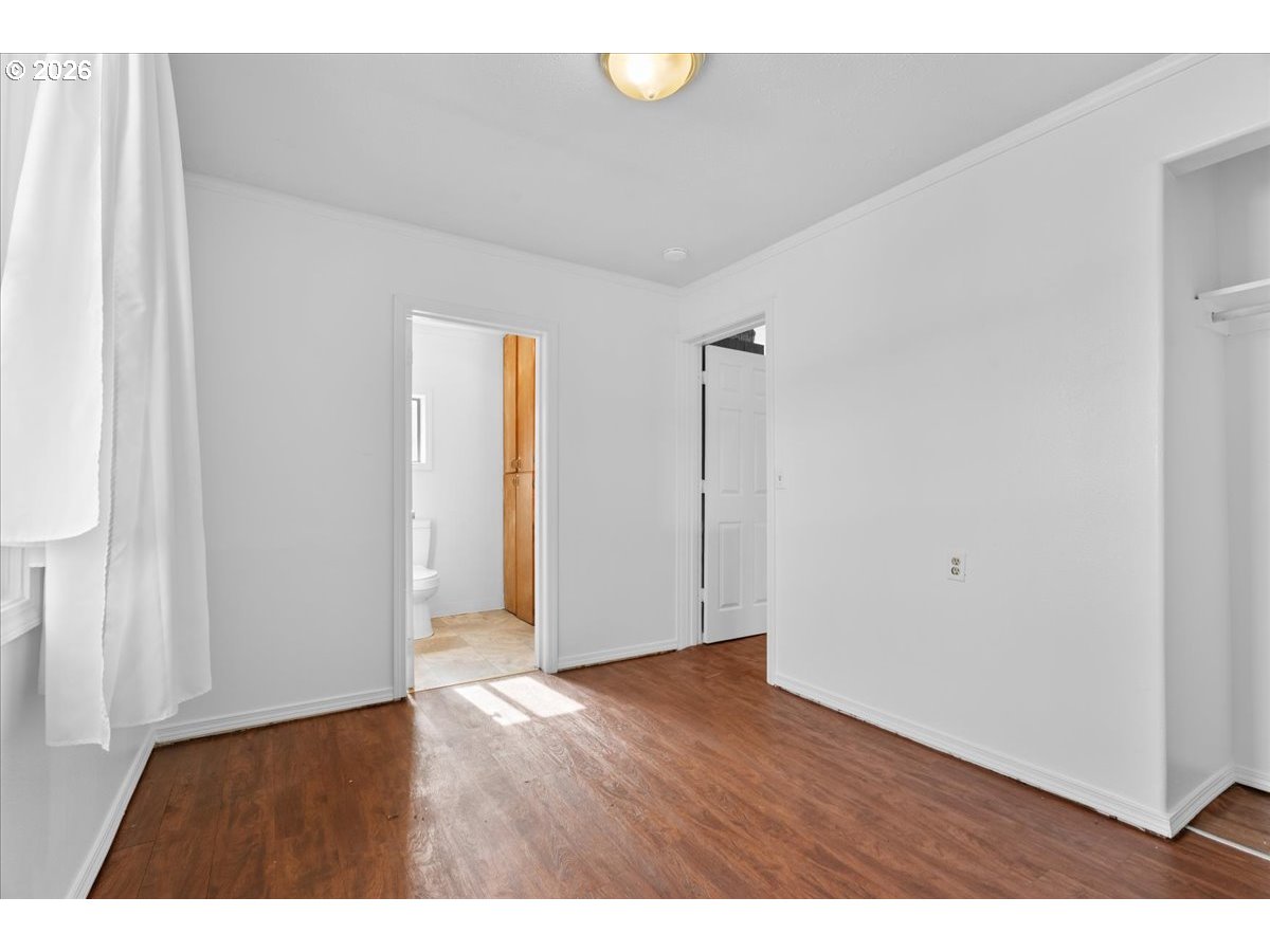 1070 Deer Island Road St. Helens, OR 97051 - Photo 19 of 34 a view of an empty room with wooden floor