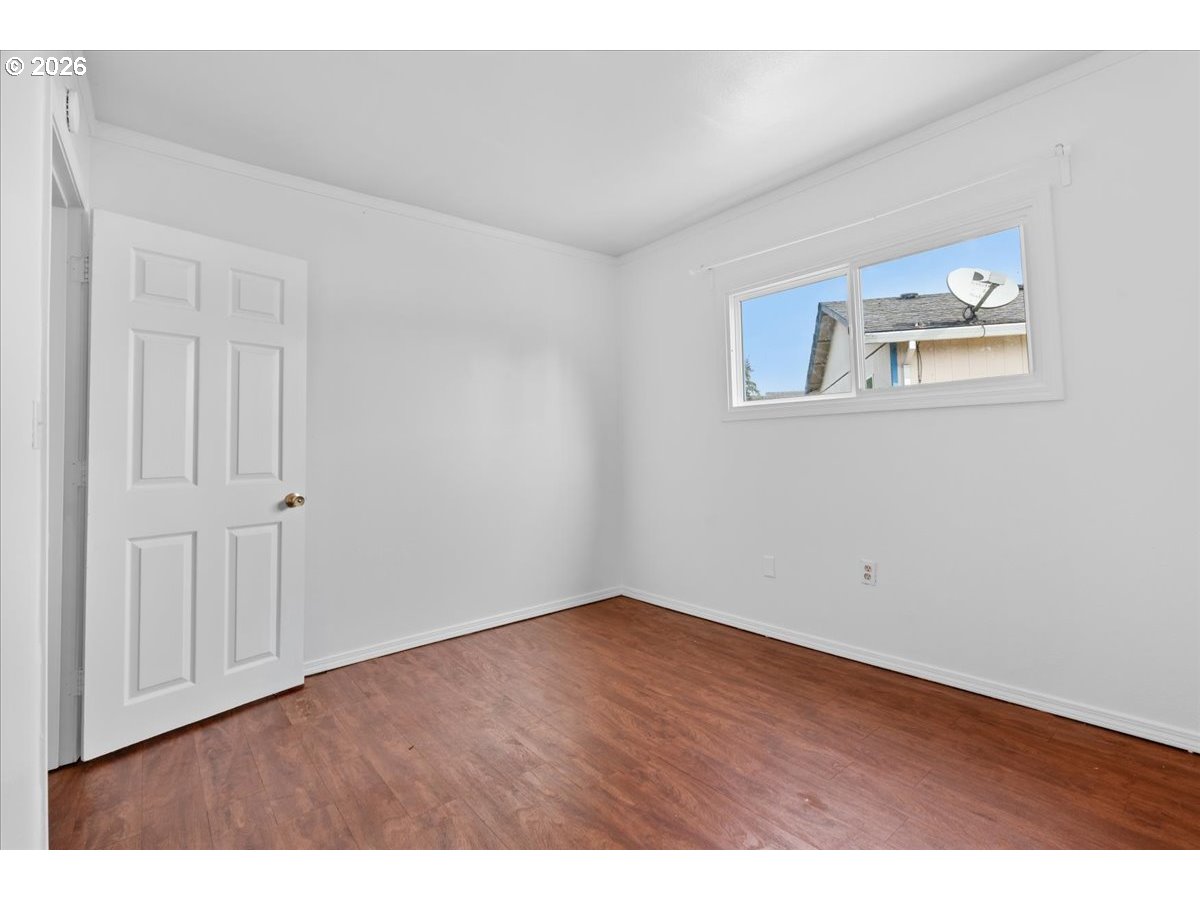 1070 Deer Island Road St. Helens, OR 97051 - Photo 25 of 34 a view of an empty room with wooden floor
