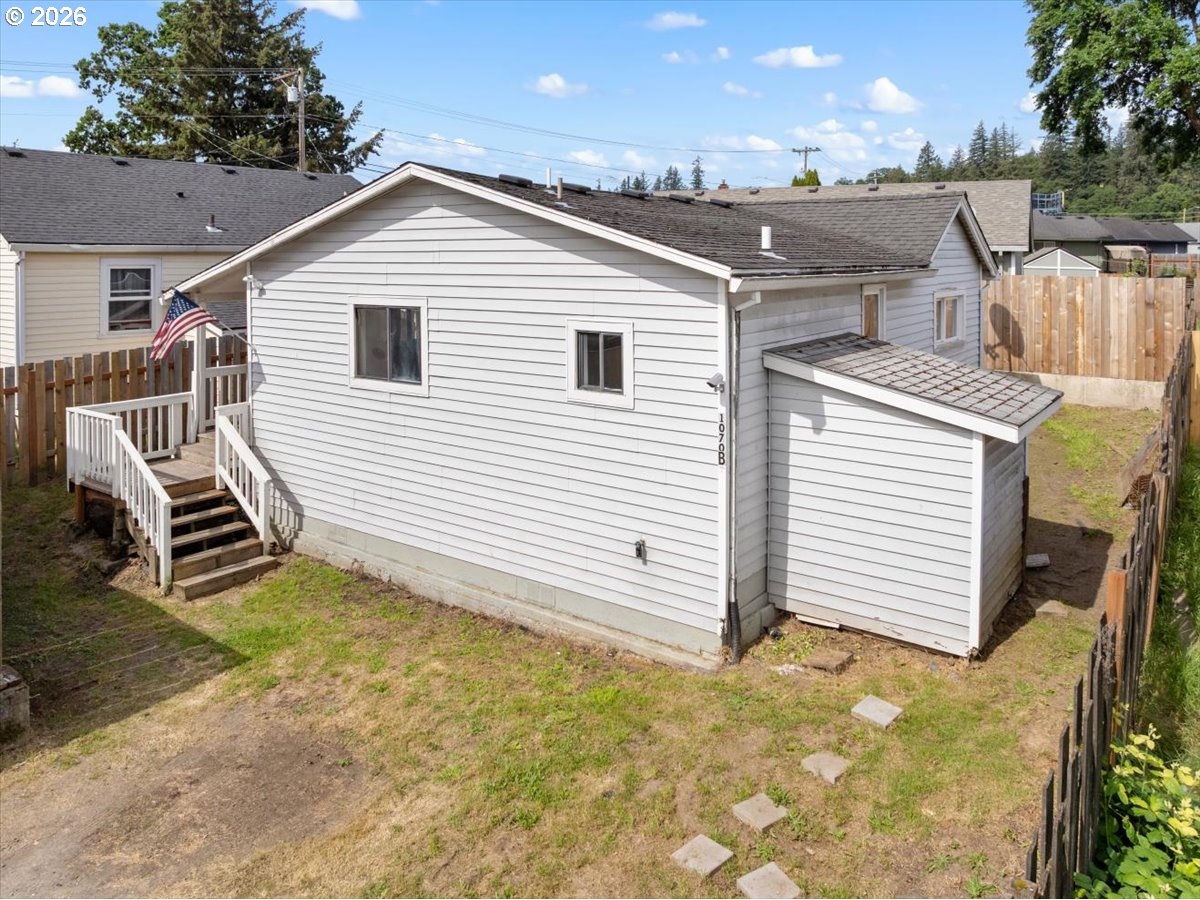 1070 Deer Island Road St. Helens, OR 97051 - Photo 3 of 34 a view of a patio with a table and chairs
