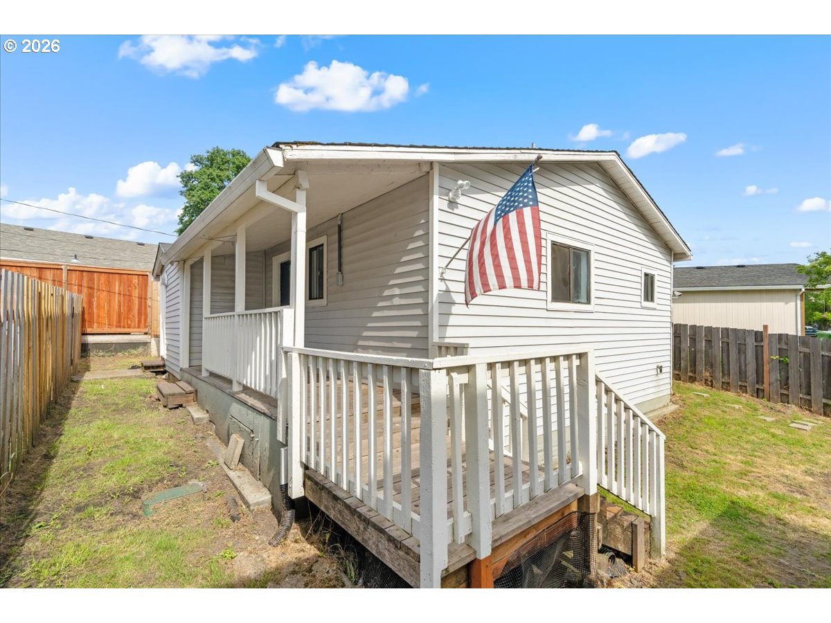 1070 Deer Island Road St. Helens, OR 97051 - Photo 6 of 34 a view of a house with a porch