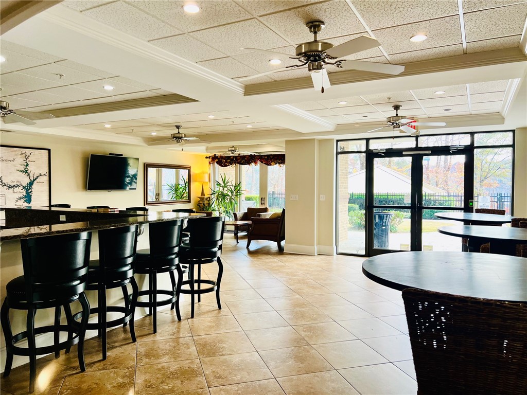 601 Watermarke Lane Anderson, SC 29625 - Photo 24 of 25 This spacious common area offers an inviting atmosphere for community gatherings and relaxation.