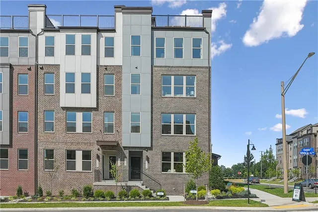 a front view of a building with street view