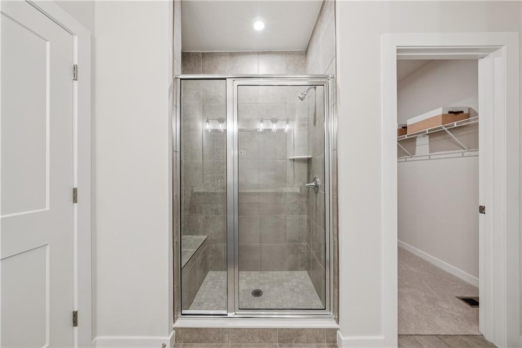306 Skylar Court Southeast, Unit 89 Atlanta, GA 30312 - Photo 17 of 26 a bathroom with a shower