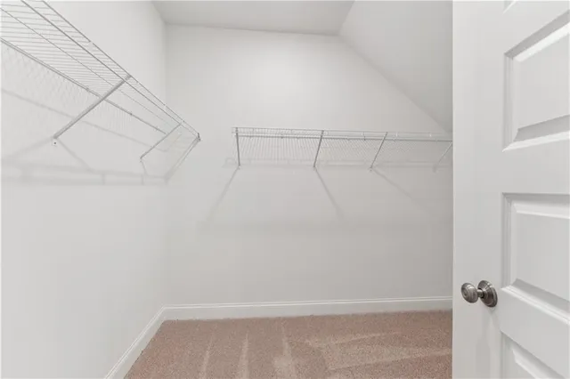 a view of small space with racks on the wall