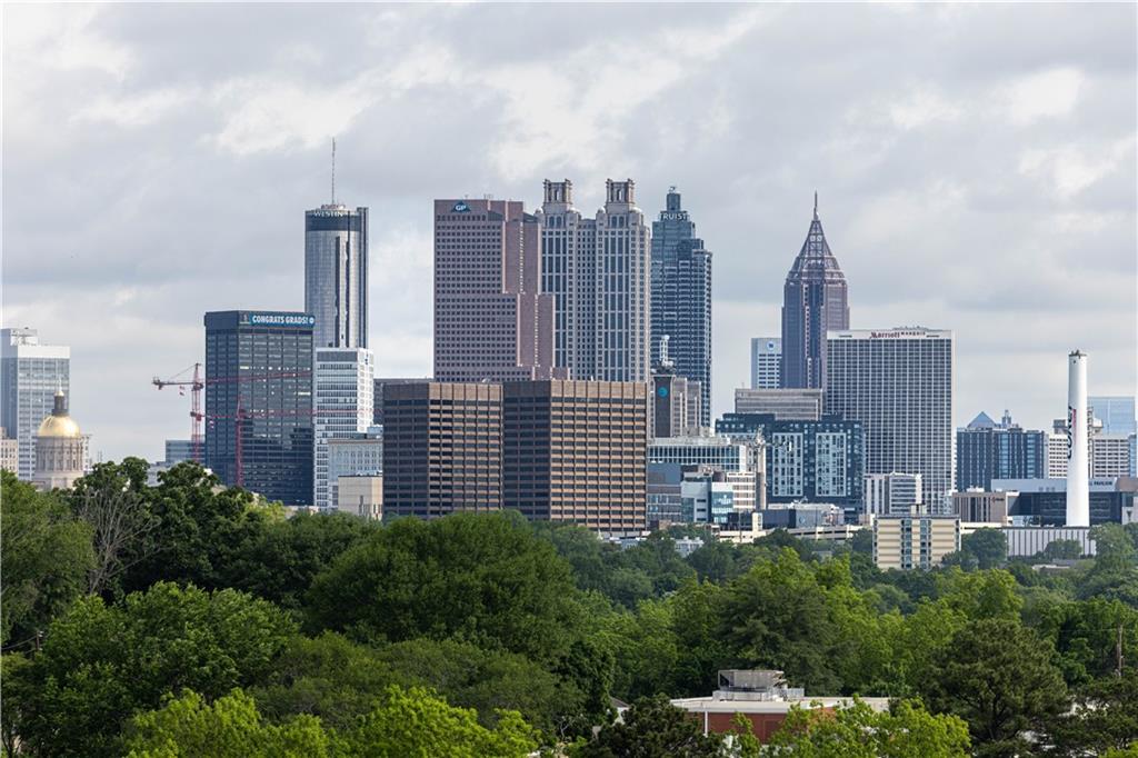 306 Skylar Court Southeast, Unit 89 Atlanta, GA 30312 - Photo 9 of 26 a view of a city with tall buildings in the background