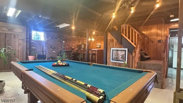 a view of swimming pool with seating area