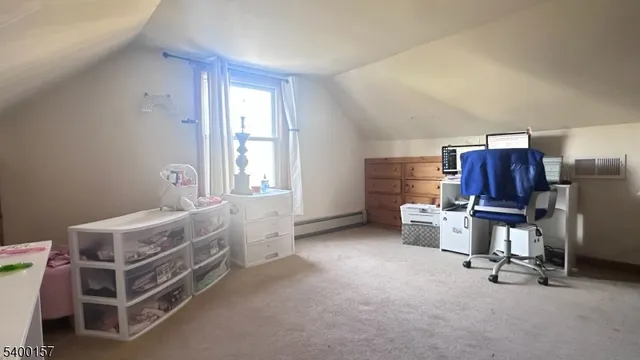 a bed room with a bed and furniture