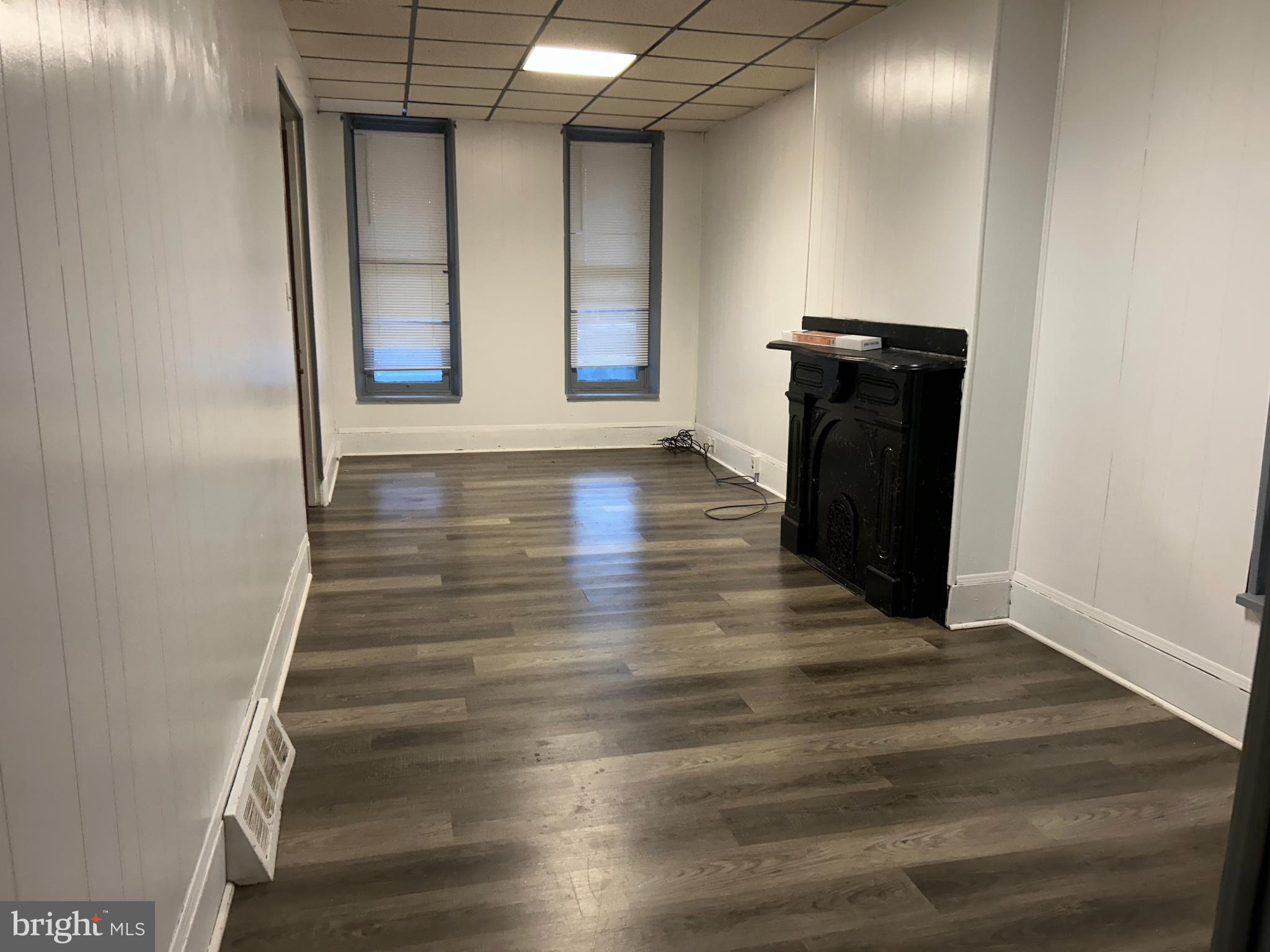 222 North 3rd Street Columbia, PA 17512 - Photo 5 of 20 Spacious living room with natural light and charm.