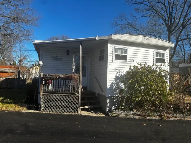 a view of a house with a street