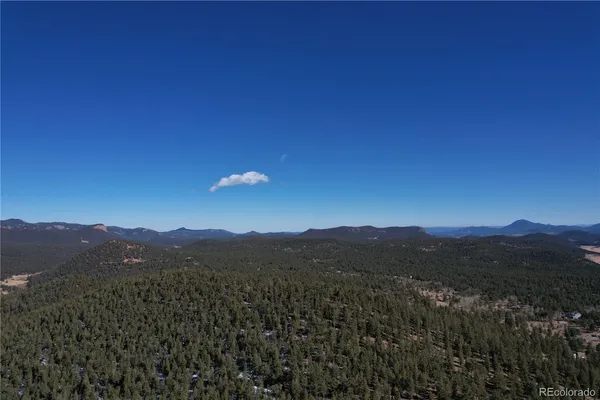 a view of a city with mountain