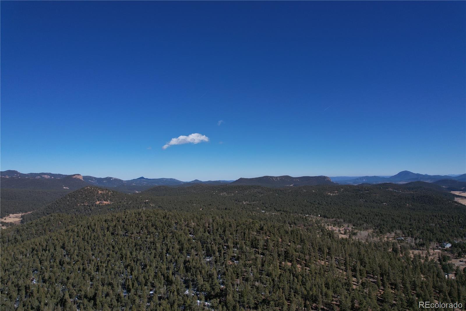 927 Forest Drive Bailey, CO 80421 - Photo 13 of 19 a view of a city with mountain