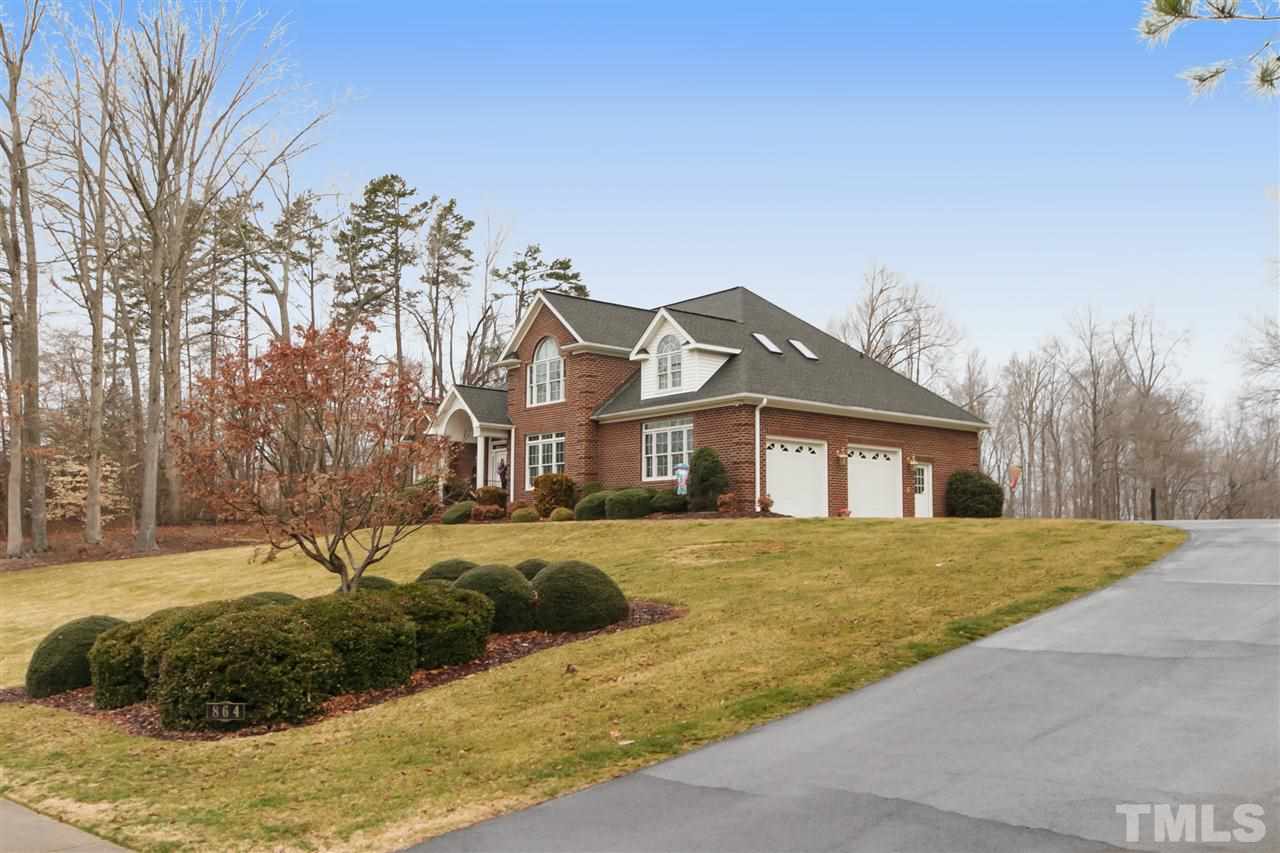 Paved Driveway and 2-Car Garage