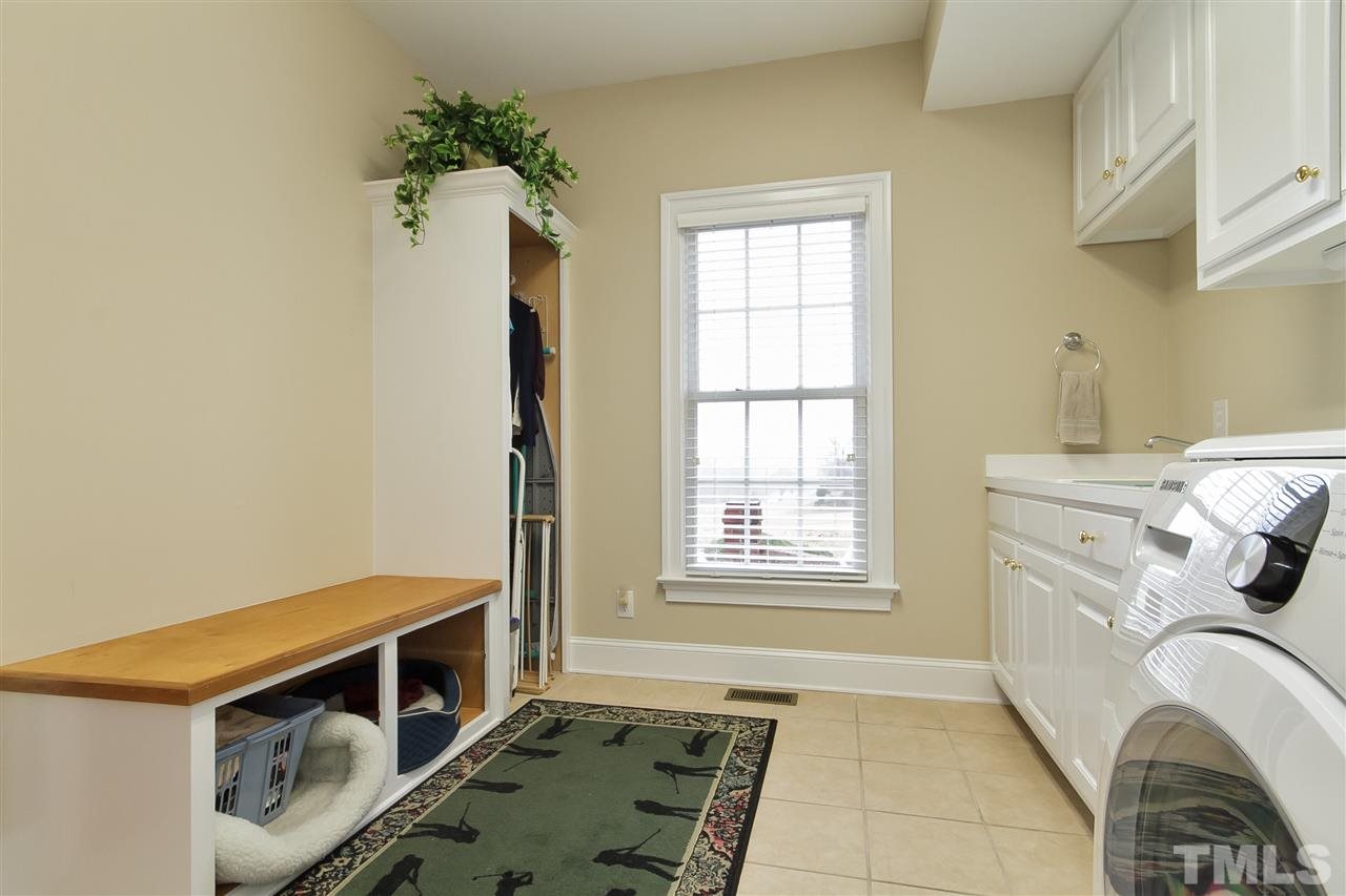 864 Rivers Edge Drive Graham, NC 27253 - Photo 12 of 25 Great Laundry Room with Lots of Organizational Storage