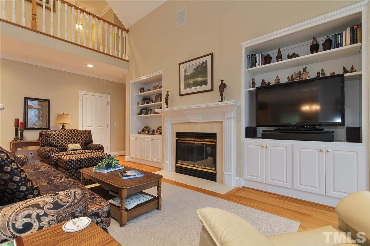 Family Room with Gas Logs and Built-In Shelves