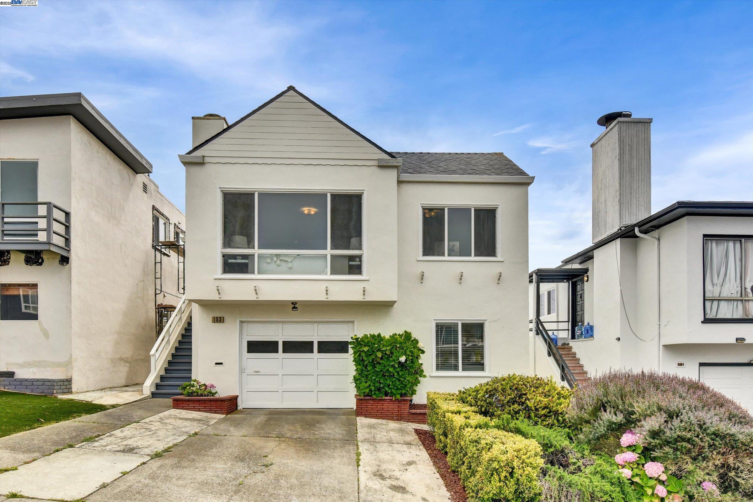 153 Morningside Drive Daly City, CA 94015 - Photo 1 of 1 a front view of a house with a yard