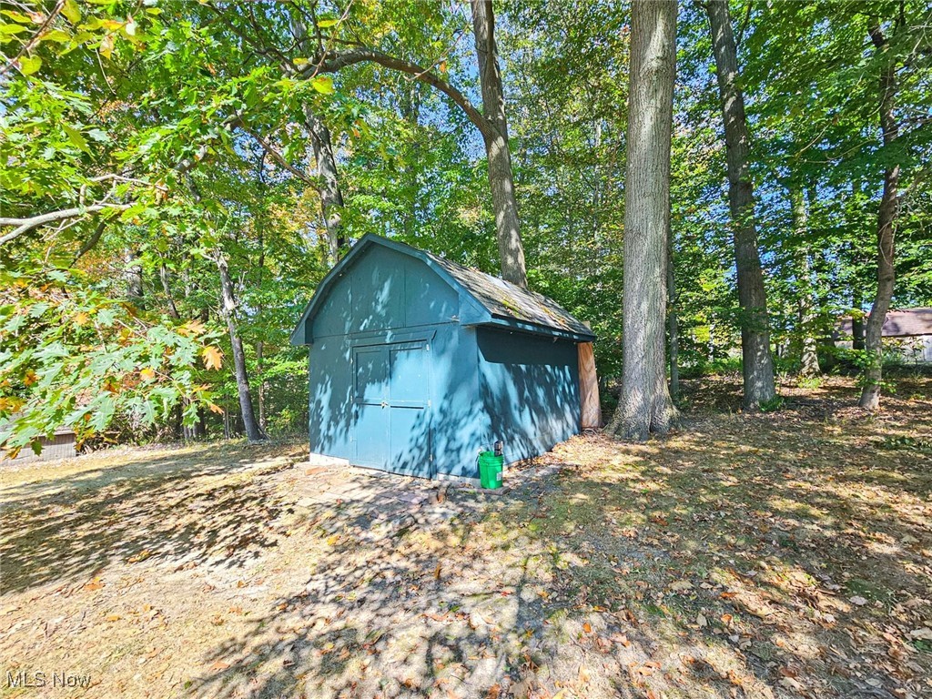 4270 Mellinger Road Canfield, OH 44406 - Photo 42 of 49 View of shed featuring view of scattered trees