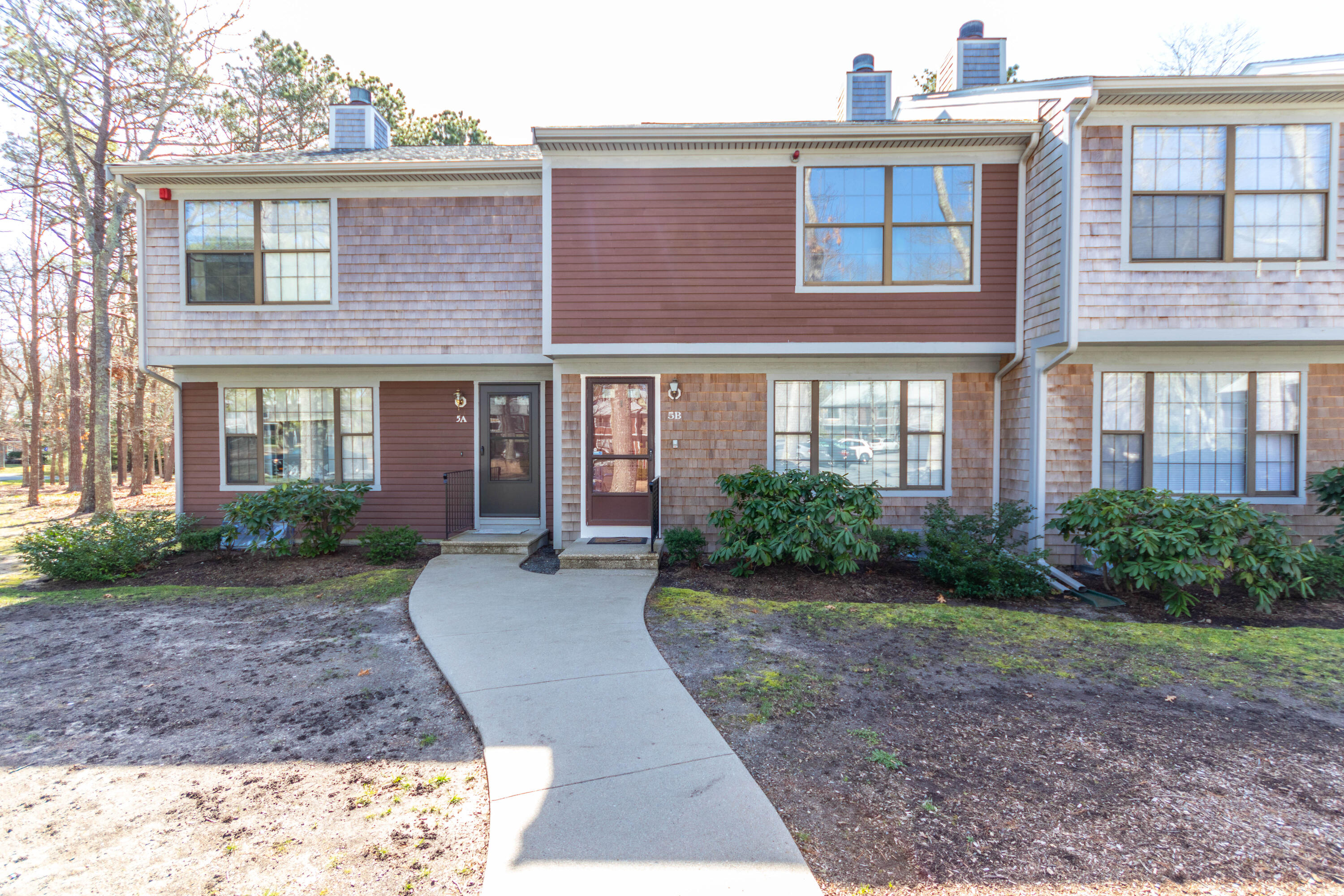 195 Falmouth Road, Unit 5B Mashpee, MA 02649 - Photo 3 of 29 Front walkway to condo