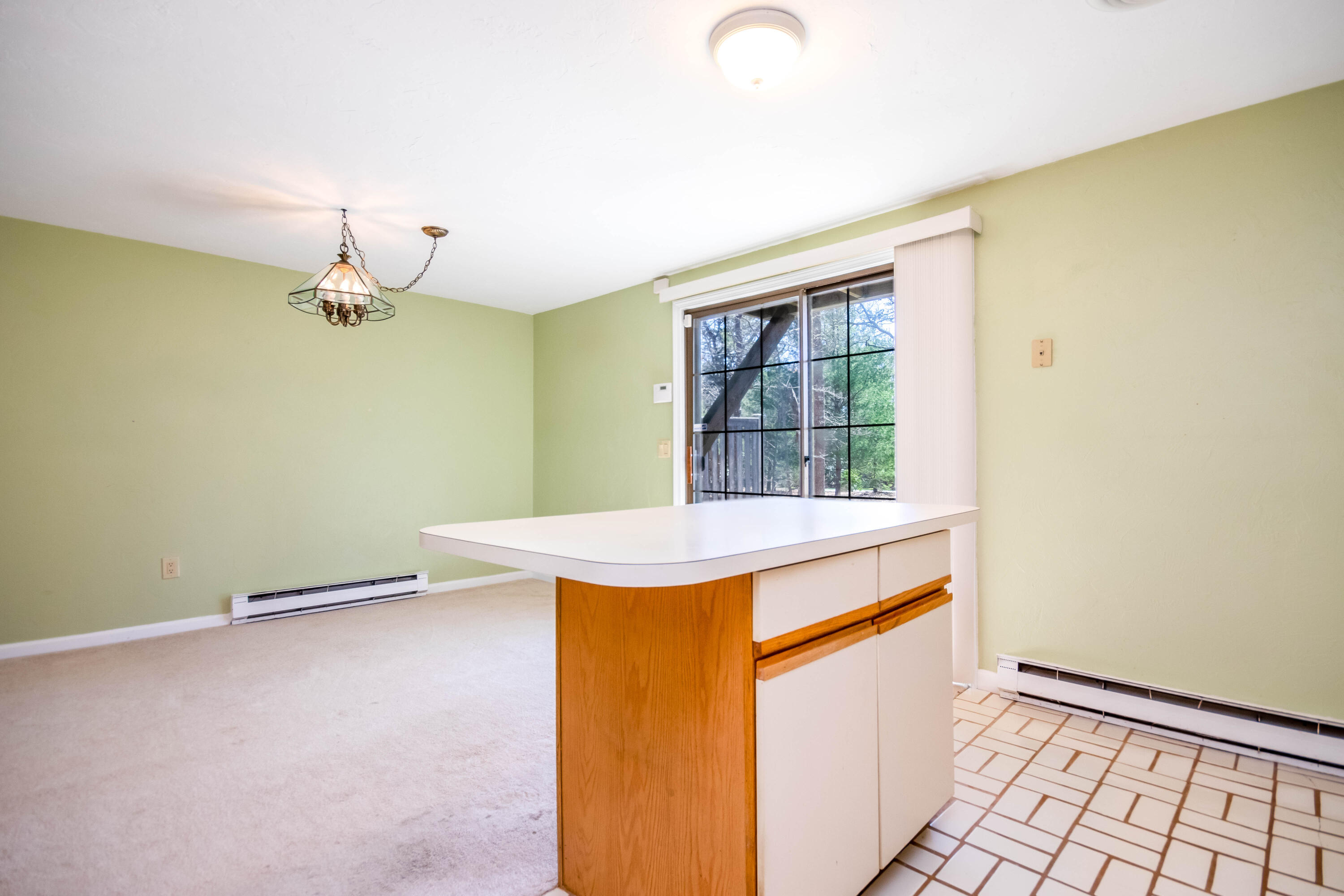 195 Falmouth Road, Unit 5B Mashpee, MA 02649 - Photo 9 of 29 Kitchen opens to dining area
