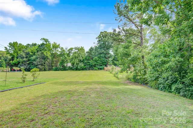 a view of outdoor space with a yard
