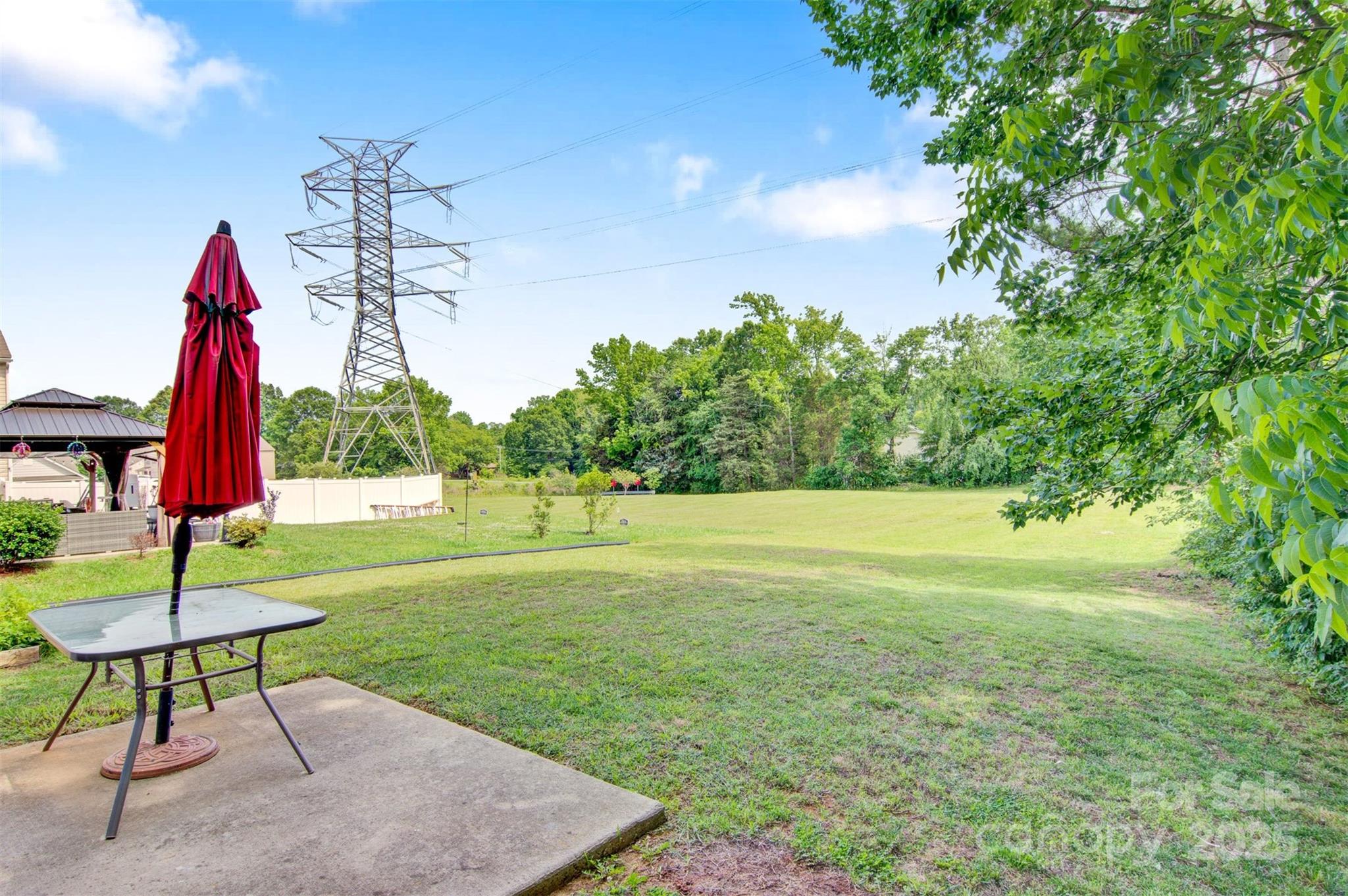 5311 Oakdale Ridge Road Charlotte, NC 28216 - Photo 29 of 35 a view of a park with a slide and a lake view
