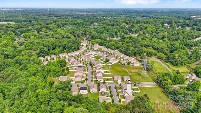 an aerial view of a residential houses