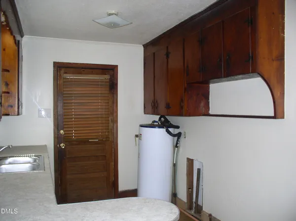a view of a hallway with closet