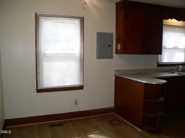 a bathroom with a sink and a window