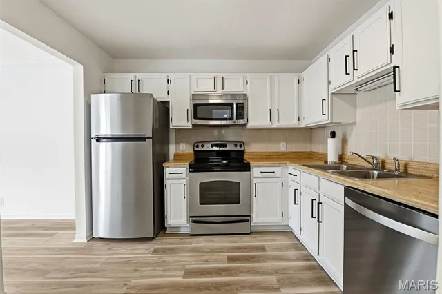 $240,000 | 604 Pine Ridge Trails Court, Unit 202, Ballwin, MO 63021