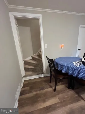 a view of hall way with furniture