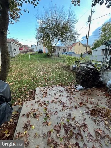 a view of a backyard with a garden