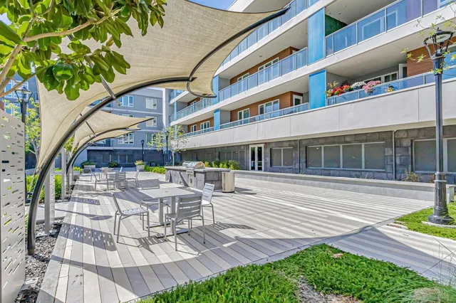 a view of a building with a patio