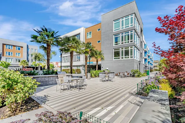 a view of a backyard with a patio