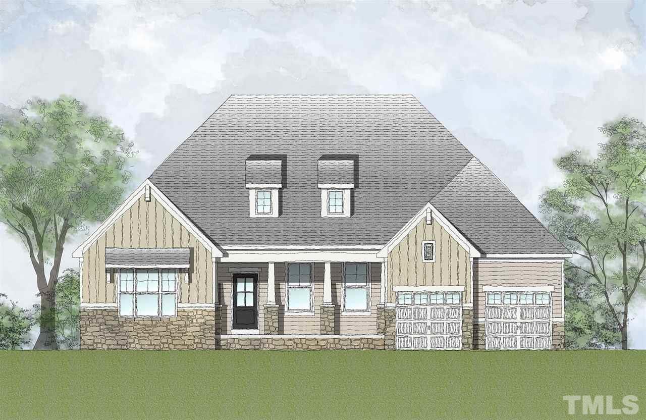 481 Adkins Ridge Road Rolesville, NC 27571 - Photo 1 of 1 a front view of a house with a garden