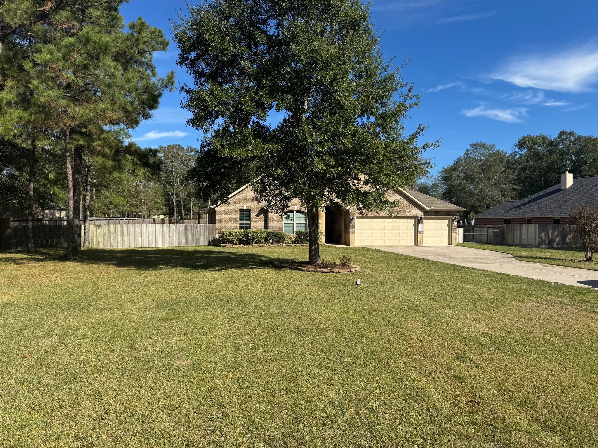 4507 Axis Trail Conroe, TX 77303 - Photo 2 of 34 a view of swimming pool with an outdoor space
