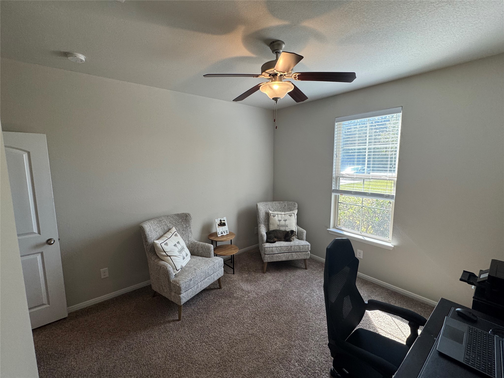 4507 Axis Trail Conroe, TX 77303 - Photo 21 of 34 a living room with furniture and a window