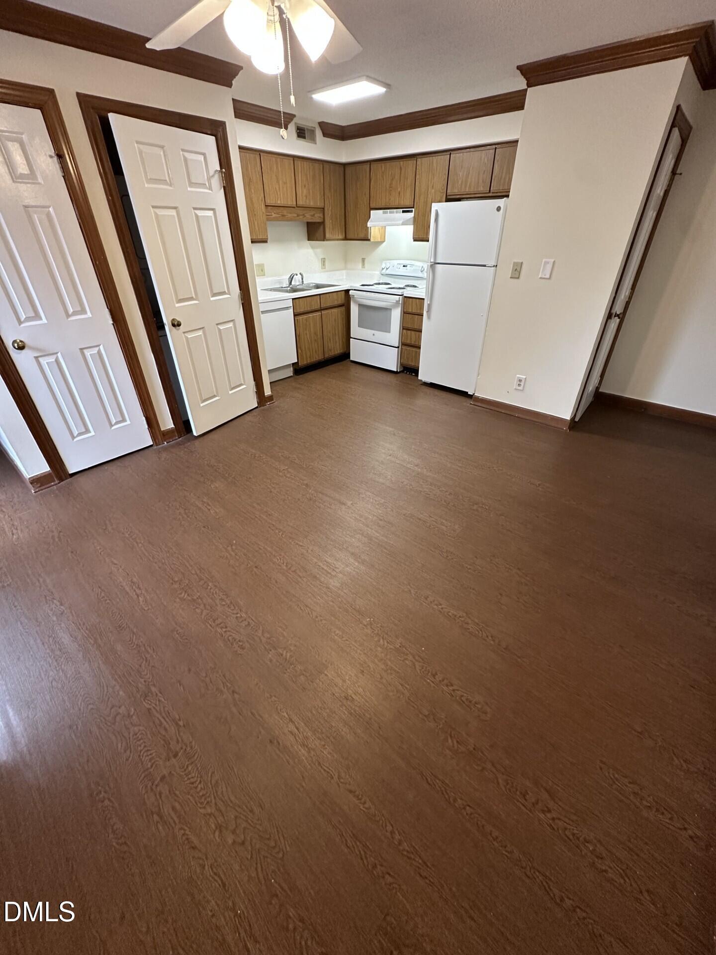 3530 Ivy Commons Drive, Unit 201 Raleigh, NC 27606 - Photo 2 of 6 a utility room with dryer and washer