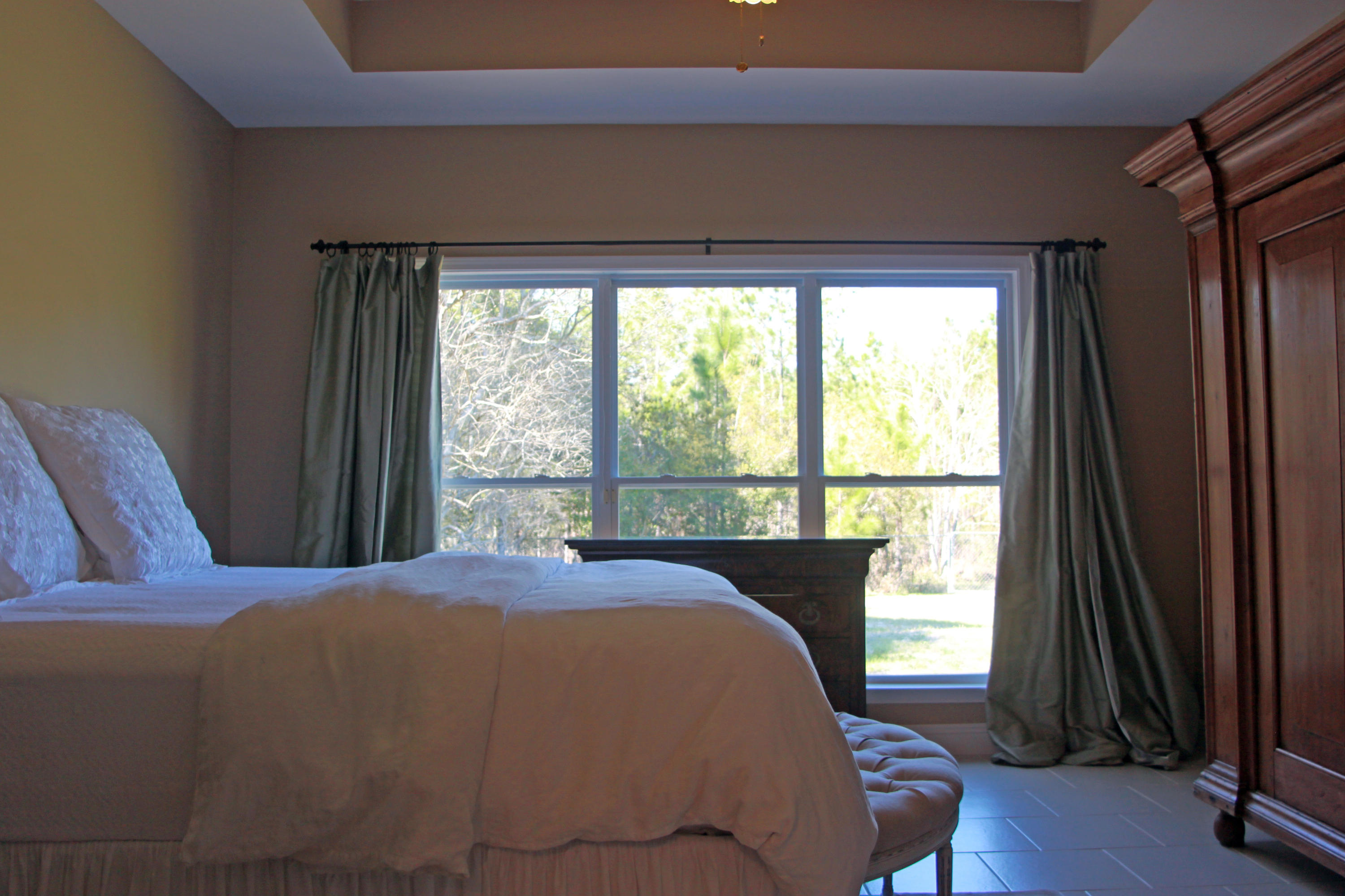 86 West Nursery Road Santa Rosa Beach, FL 32459 - Photo 14 of 20 a bedroom with a bed and a window
