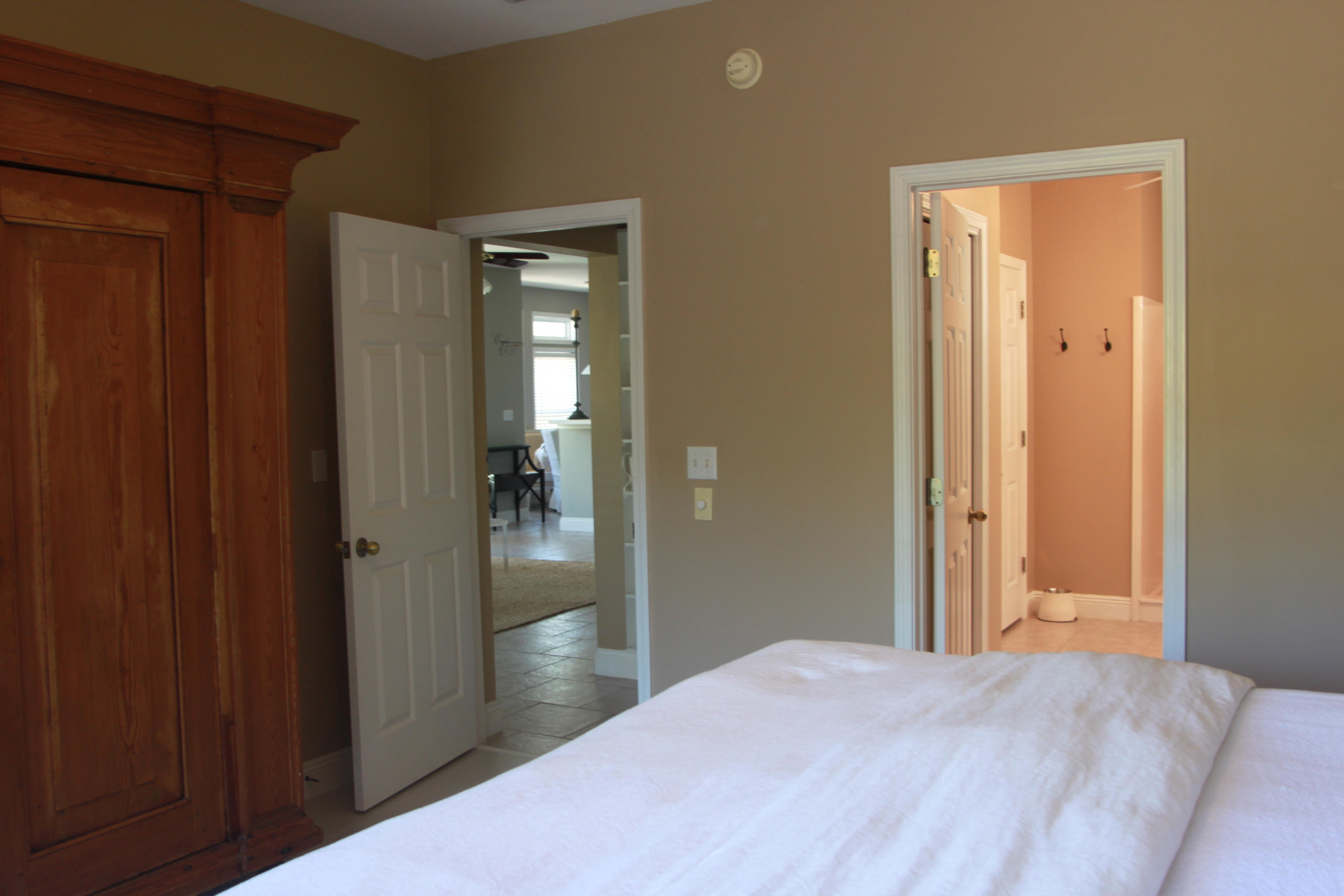86 West Nursery Road Santa Rosa Beach, FL 32459 - Photo 15 of 20 a view of a bedroom from a hallway
