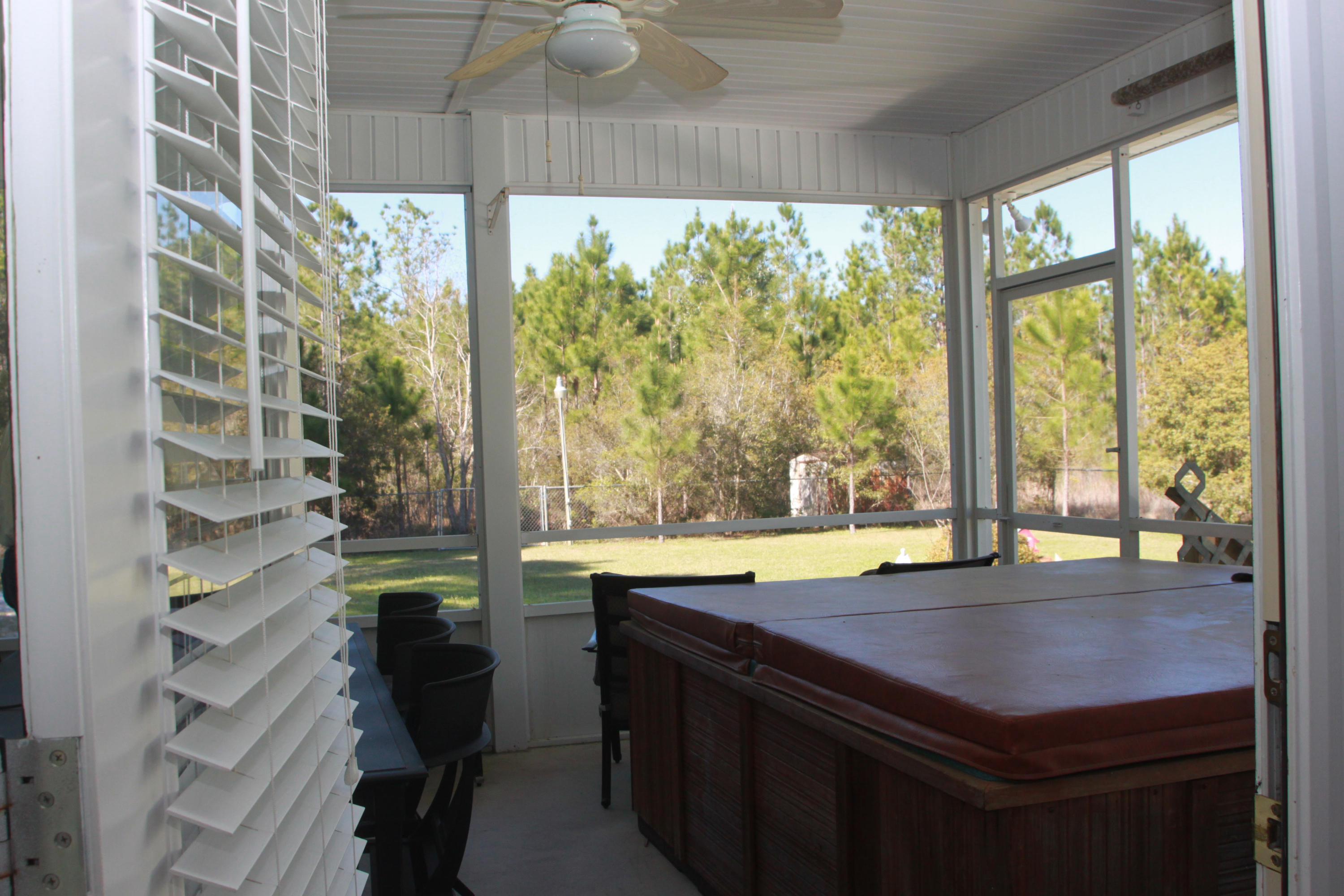 86 West Nursery Road Santa Rosa Beach, FL 32459 - Photo 20 of 20 a room with pool table and windows