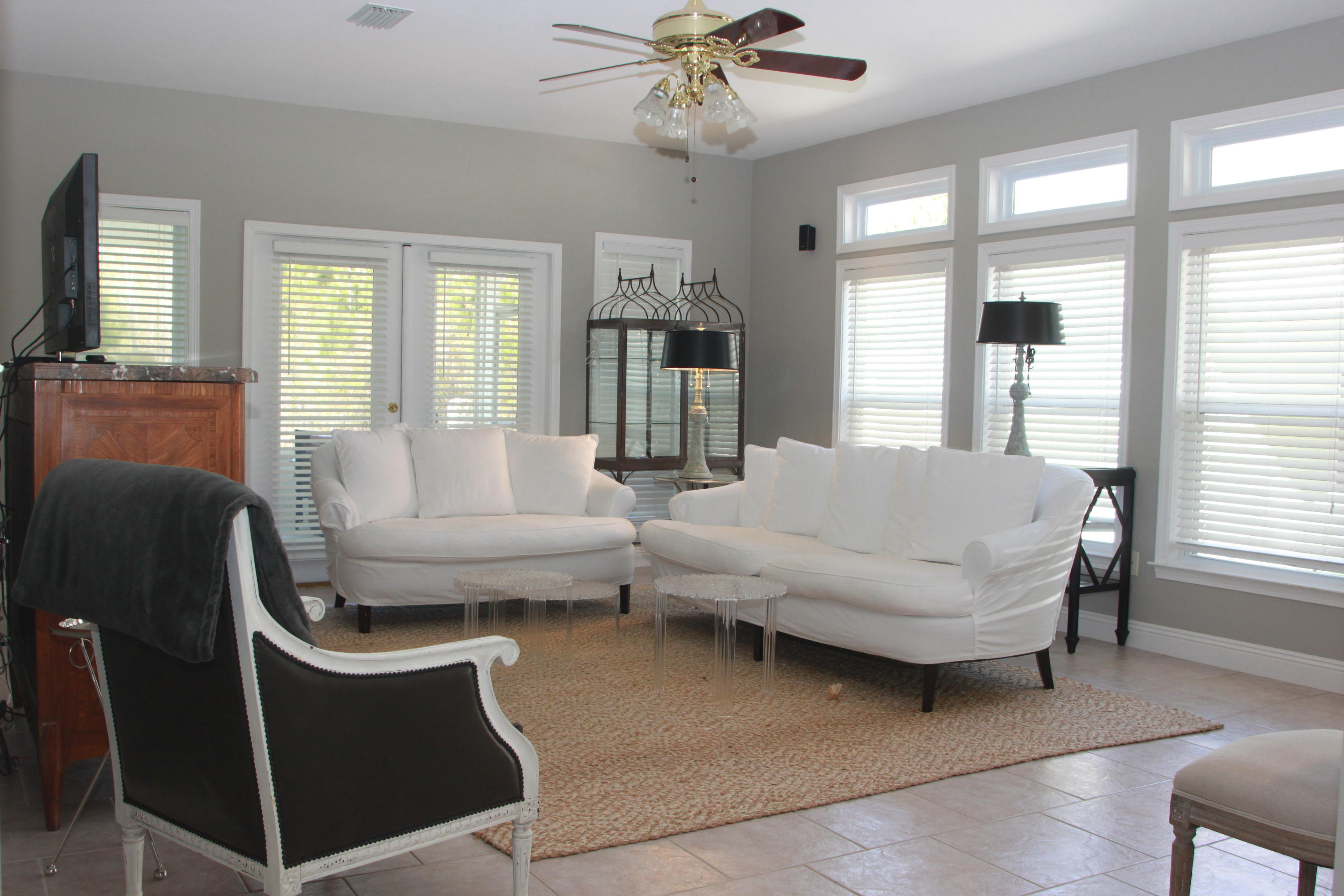 86 West Nursery Road Santa Rosa Beach, FL 32459 - Photo 6 of 20 a living room with furniture and a large window