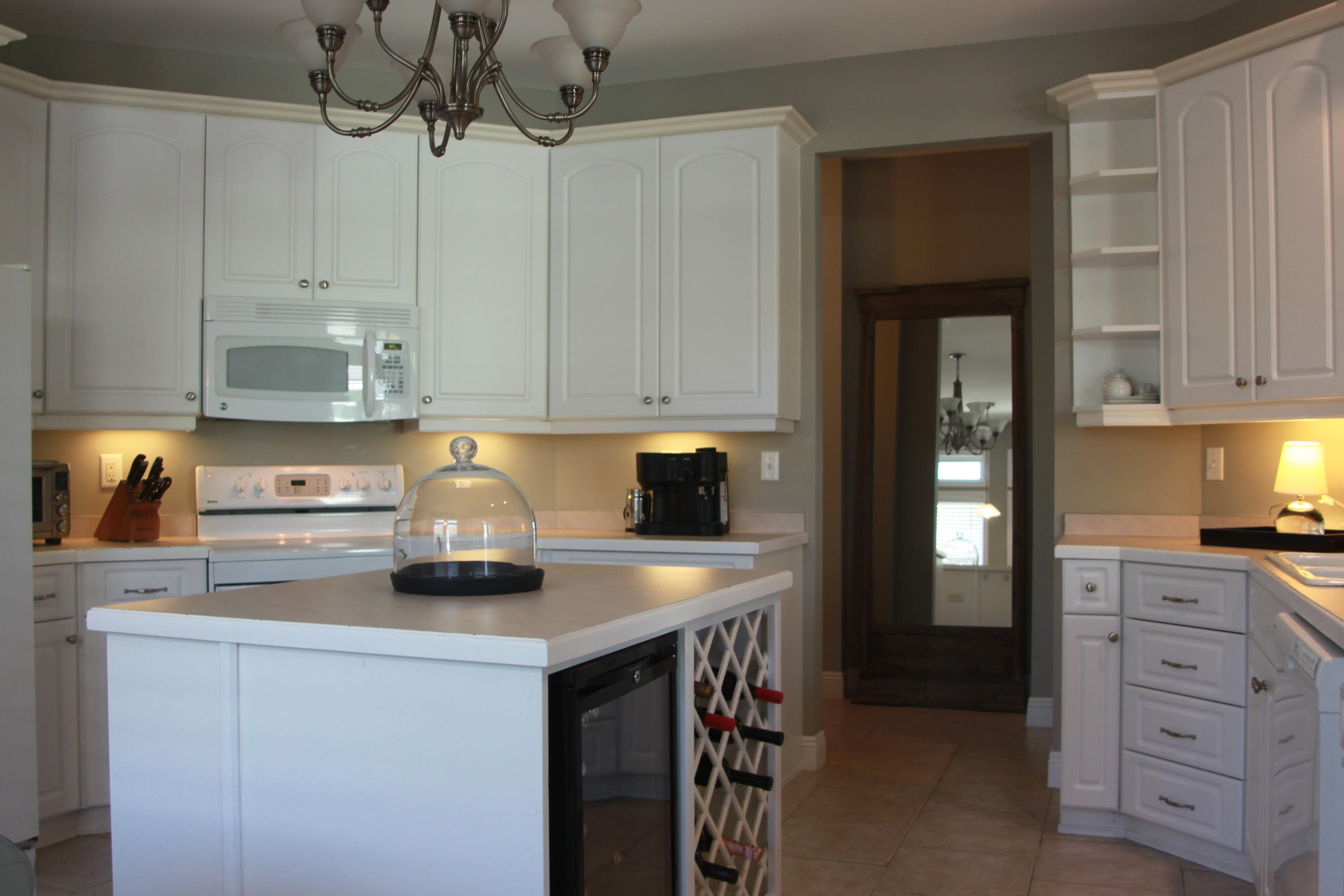 86 West Nursery Road Santa Rosa Beach, FL 32459 - Photo 9 of 20 a kitchen with a sink and cabinets